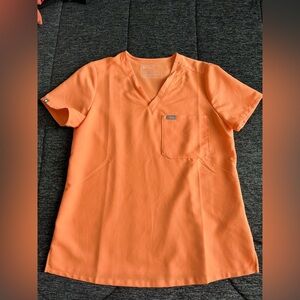 Figs set ( Zamora jogger pants and Catarina top ) 

Shaka Orange